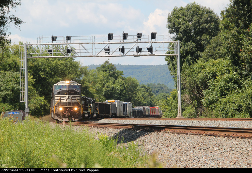 NS 7207 heads train 10K, track 2, at milepost 116